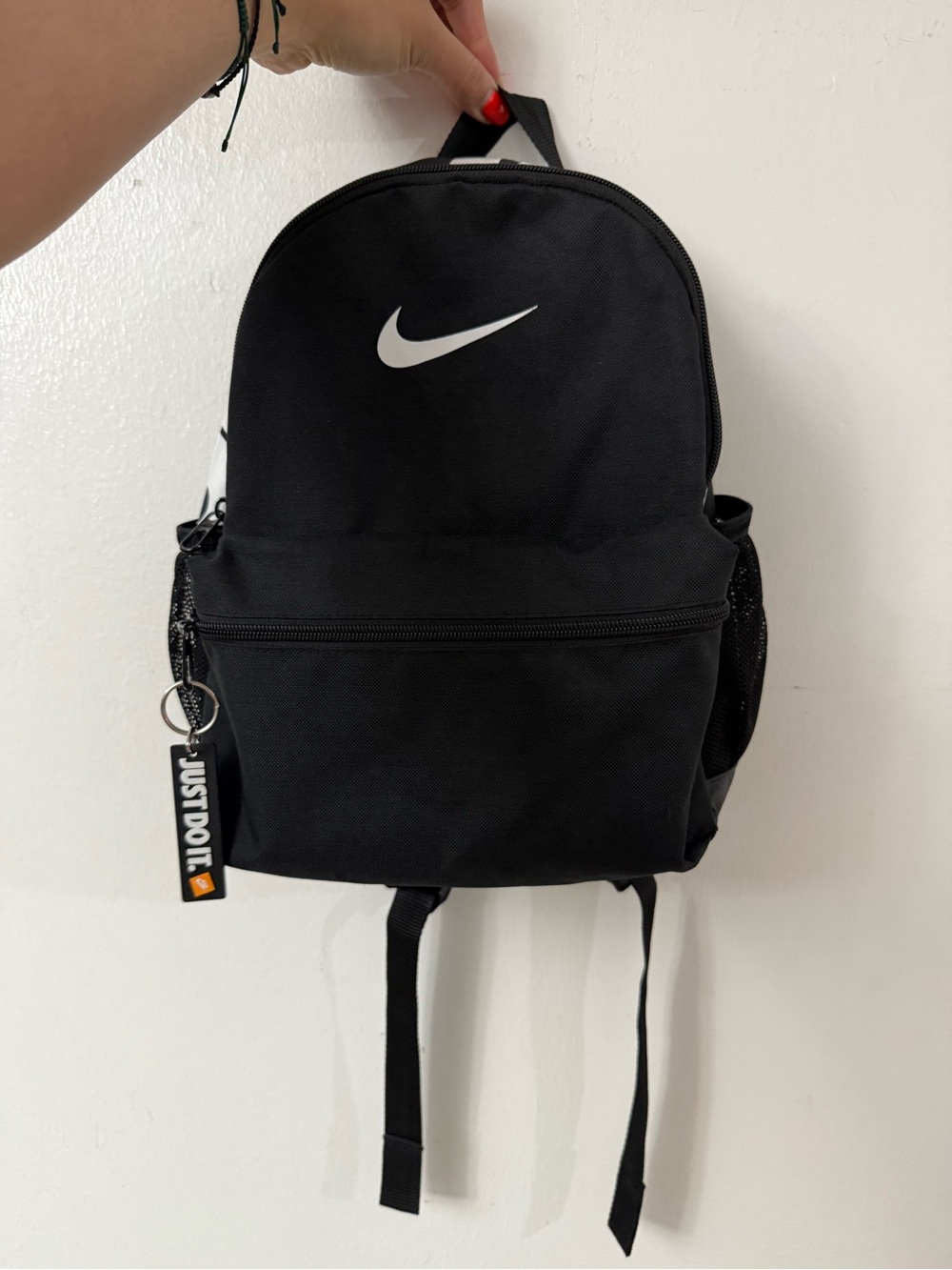 Nike Black Mini Backpack with White Swoosh and Key Tag